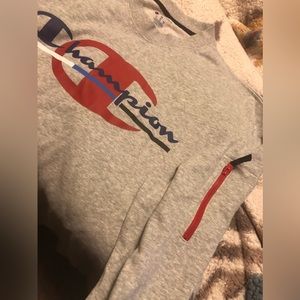 Champion sweatshirt. Long sleeves. Zipper on sleeve. Hard to find style.
